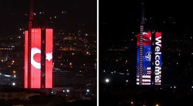 The flags of NATO member countries were projected onto a building in Ankara.