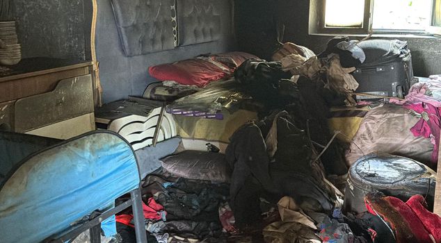 The passing truck driver noticed, and the family of 22 returned from disaster.