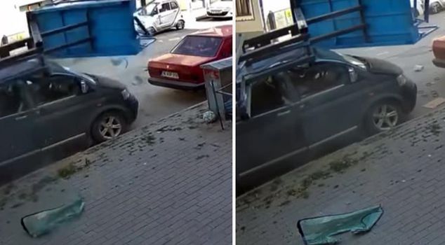 Moments when the cargo elevator overturned onto the minibus are captured on camera.