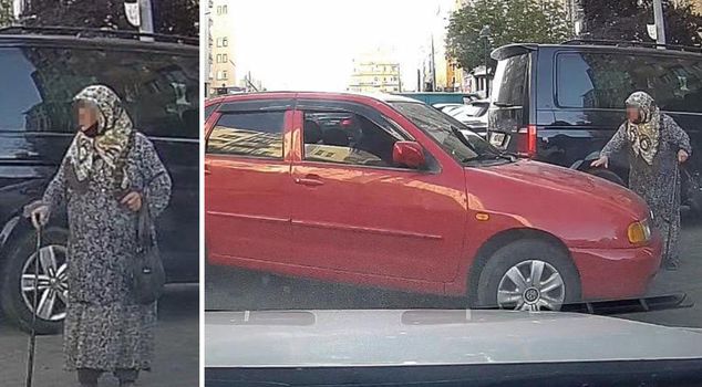 The old woman with a cane won the parking spot battle.