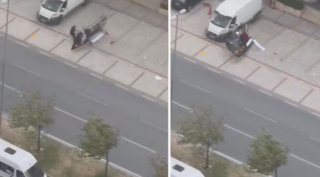 A sign fell on a pedestrian walking due to a storm in Istanbul.
