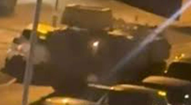 In the UK, two intoxicated soldiers at a military base crashed an armored vehicle into parked cars.