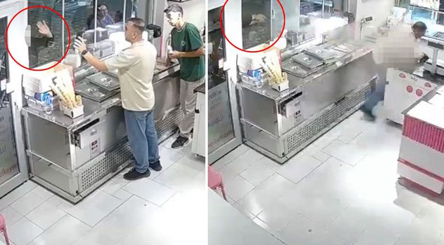 He first waved to the person on the cell phone, then killed him with a pistol.