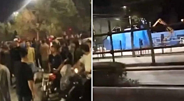 Two people who killed police officers in Iran were executed in front of thousands of people.
