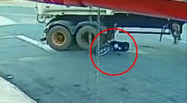 He was dragged under the huge truck and escaped without even a nosebleed.