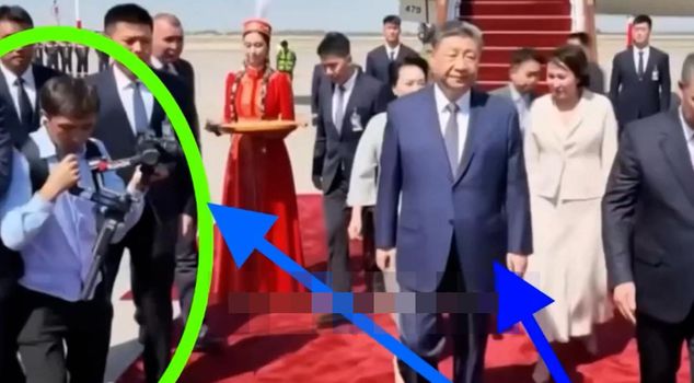 The price of getting one step too close to the Chinese leader! Dragged away by the collar.