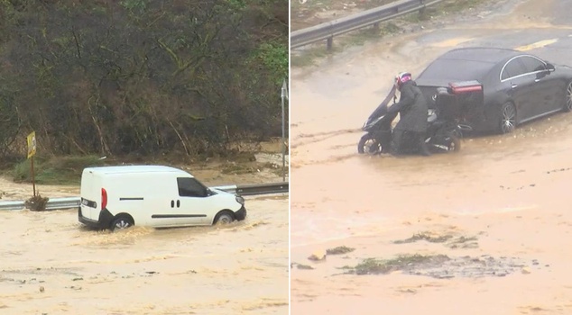 In Başakşehir, a stream overflowed due to heavy rain, and vehicles were stranded on the road.