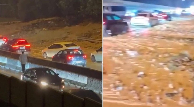 Mud carried by floodwaters in Kartal closed one lane of the TEM connection road.