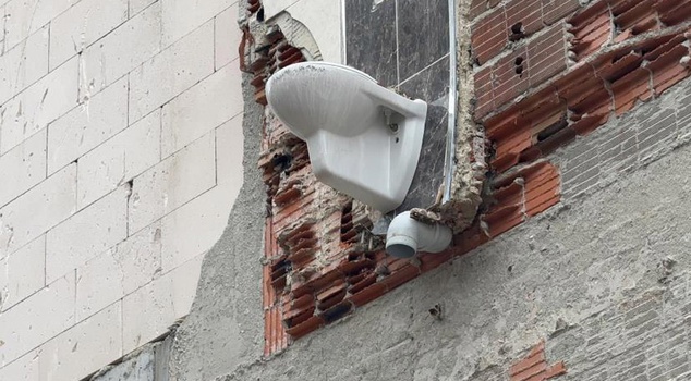 This footage is from Istanbul! All that's left of the collapsed building is a toilet hanging on the third floor.