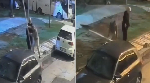 В Султангази они сняли знак пешеходного перехода рядом с припаркованным автомобилем.