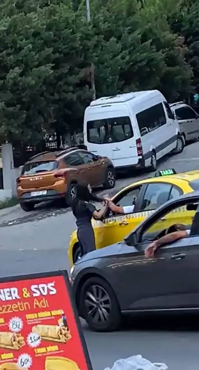 Taksici tartıştığı kızı yumruk atarak bayılttı