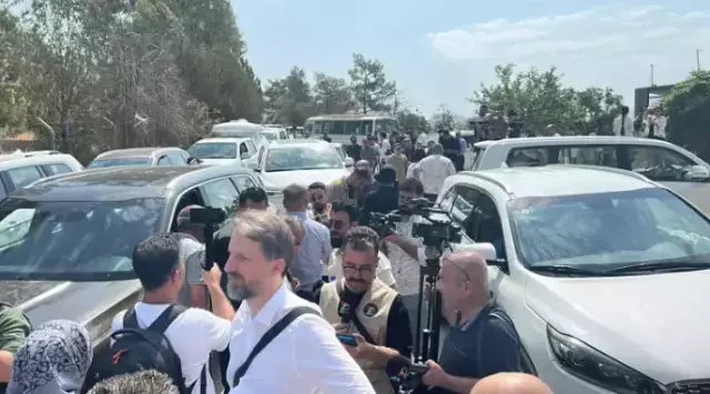 PKK'lı teröristler silahlarını içinde ateş yanan kazana atacak