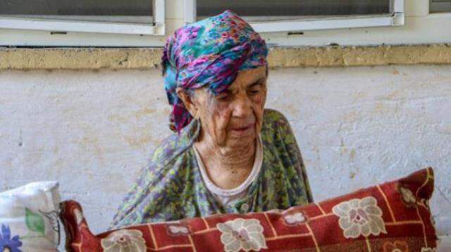 Milyonların yüreğini yakan fotoğraftaki kadın Alzheimer hastası çıktı! Evinin yandığını bile bilmiyor
