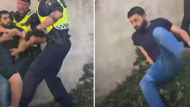İsveç'te cami önünde Kur'an-ı Kerim yakan provokatöre taş atmak isteyen şahsa polis müdahale etti