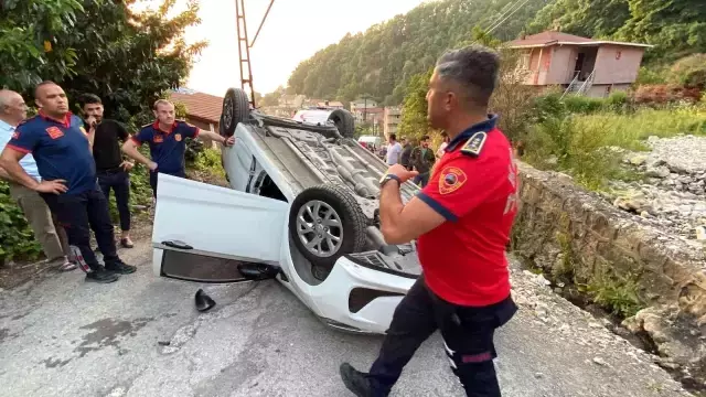 Takla atan araçtan burunları bile kanamadan çıktılar
