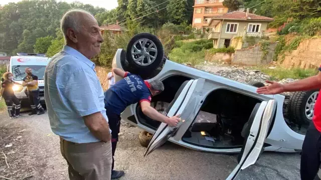 Takla atan araçtan burunları bile kanamadan çıktılar