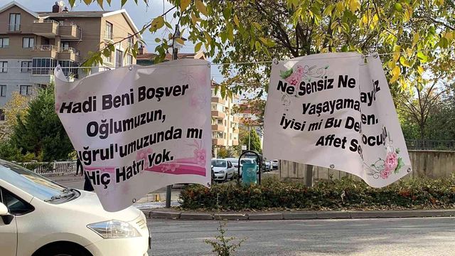 Bursa'da eşine kendisini affettirmek için çalıştığı marketin karşısına pankart astı