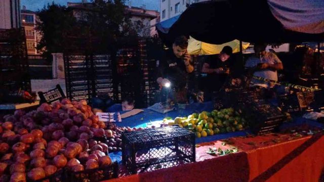 Kadın kılığında pazara gelip, eteğin altına sakladığı silahı peş peşe ateşledi