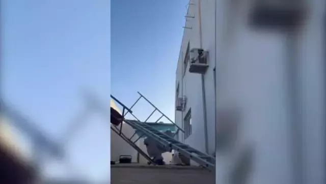 Sırtındaki klimayla birlikte metrelerce yükseklikten düştü