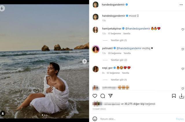 Güzel oyuncu Hande Doğandemir, yorgana sarılarak denizin içinde poz verdi