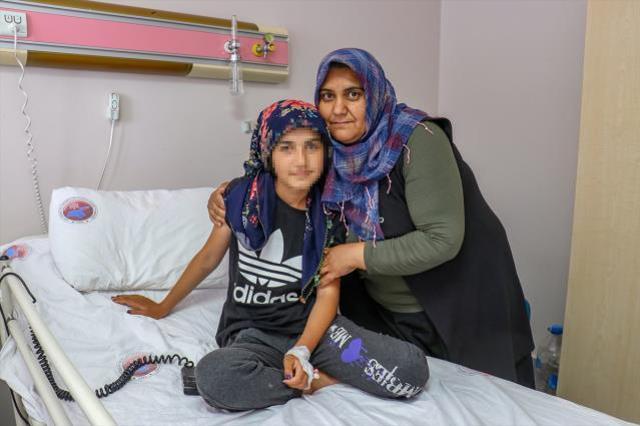 Beyninde damar yumağı oluşan çocuk, 20 saatlik ameliyatla hayata tutundu