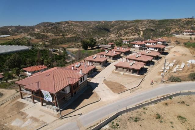 Antalya'da yangından etkilenen vatandaşların evleri için kura çekiliyor