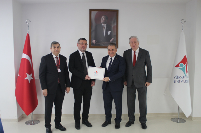 Yüksek İhtisas Üniversitesi ve USHAŞ Arasında İş Birliği Protokolü İmzalandı