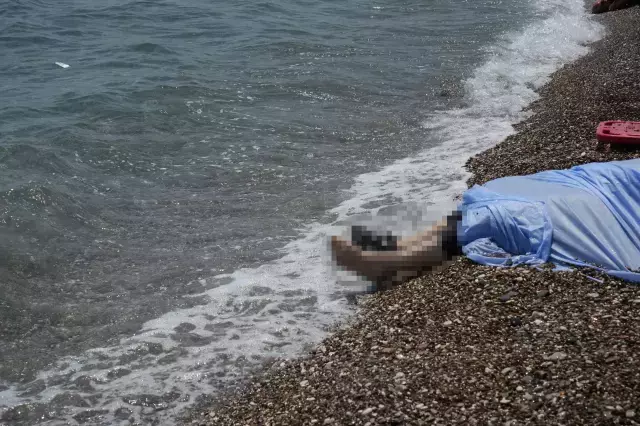 Konyaaltı Sahili'nde vücudunda kesikler bulunan erkek cesedi bulundu