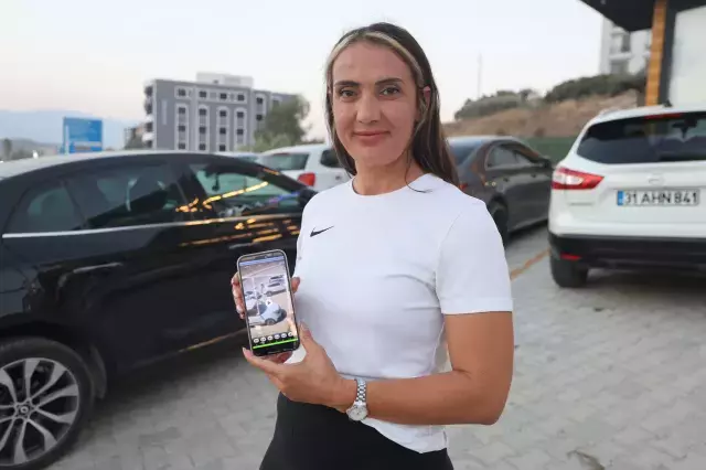 El freni çekilmeyen otomobili tek eliyle durdurdu