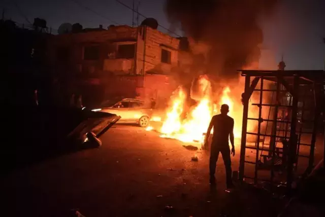 İsrail Askerleri Batı Şeria'da 18 Filistinliyi Öldürdü