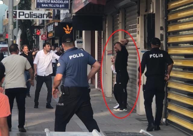 Polise teslim olmamak için yanındaki kadını tabancayla rehin aldı