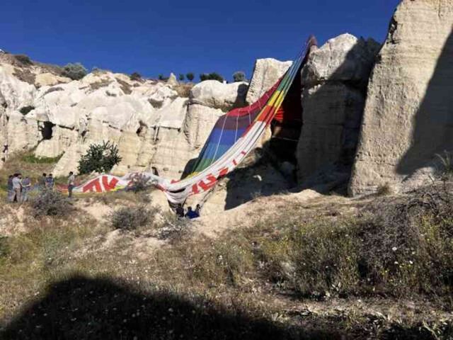 Yüzlerce metre yüksekte korku dolu anlar! Balon pilotu 20 kişinin hayatını kurtardı