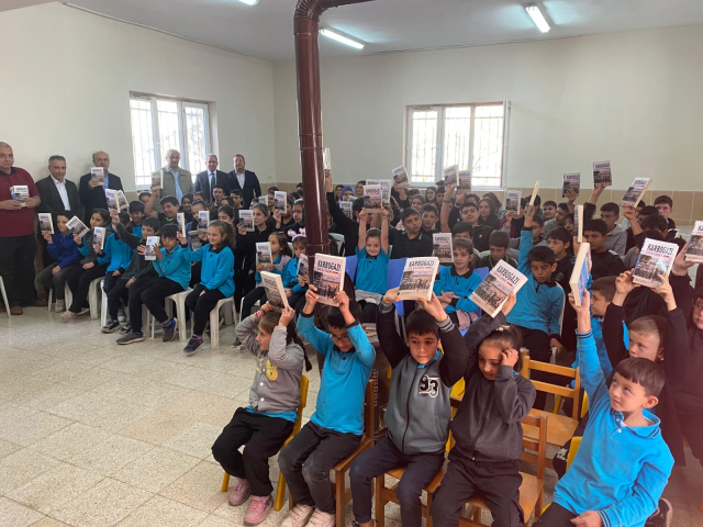 Karboğazı Destanı kitabı yayınlandı... İlk kitabı okuduğu okula armağan etti