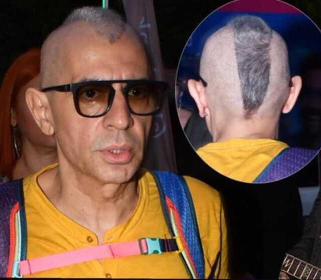 Konsere giden Okan Bayülgen'in yeni saç stili görenleri şaşkına uğrattı