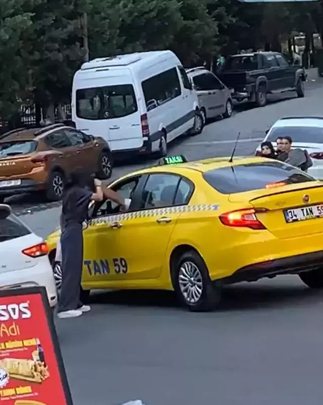 Taksici tartıştığı kızı yumruk atarak bayılttı