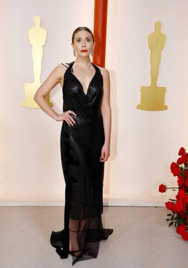 Ünlü şarkıcı, kalçasına kadar inen tül elbisesiyle kırmızı halıya damga vurdu! İşte 2023 Oscar Ödülleri'nin en şıkları
