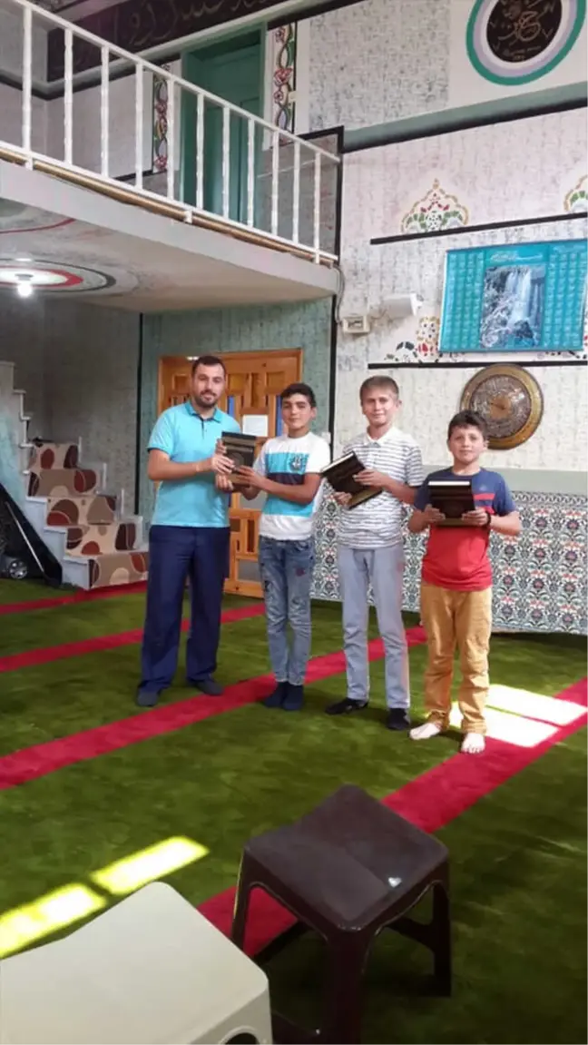 Koyulhisar'da Öğrencilere Kur'an-ı Kerim Dağıtıldı