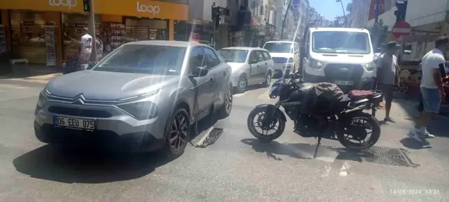 Manavgat'ta kırmızı ışık ihlali yapan motosikletin otomobile çarpması sonucu sürücü yaralandı