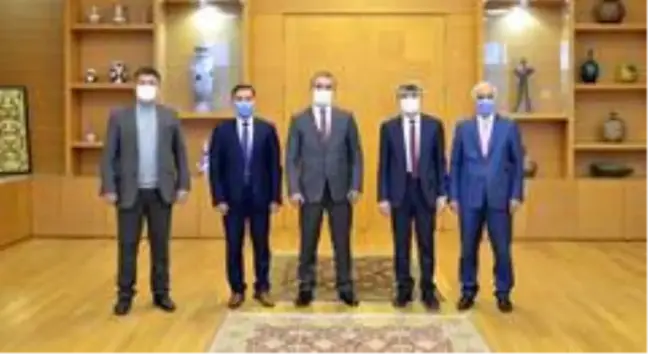 HİTÜ Rektörü Öztürk, DPÜ Rektörü Uysal'ı ziyaret etti
