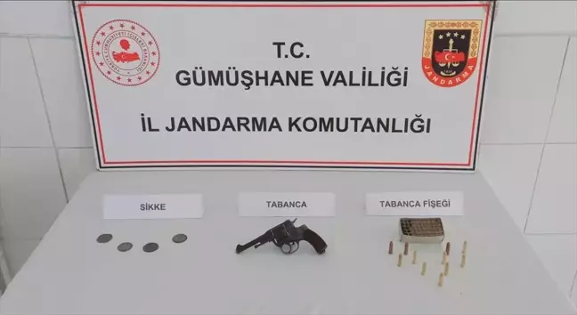 Gümüşhane'de Kaçakçılık Operasyonu: Ruhsatsız Tabanca ve Sikkeler Ele Geçirildi