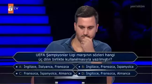 UEFA Şampiyonlar Ligi marşının sözleri hangi üç dilin bilirlikte kullanılmasıyla yazılmıştır?