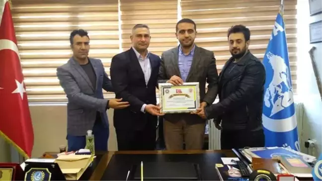 Yılan'a Teşekkür Plaketi
