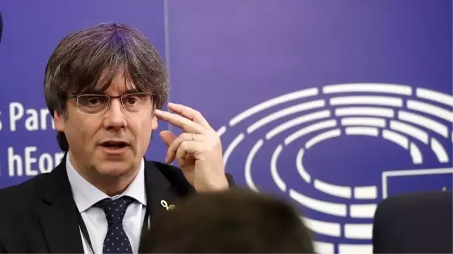 İspanya'da hakkında yakalama kararı olan Katalan lider Puigdemont AP'de ilk oturumuna katıldı