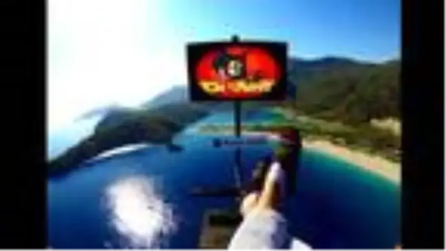 Ölüdeniz'de 'koltukla' uçtu, televizyon izledi