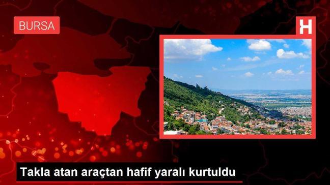 Takla atan araçtan hafif yaralı kurtuldu