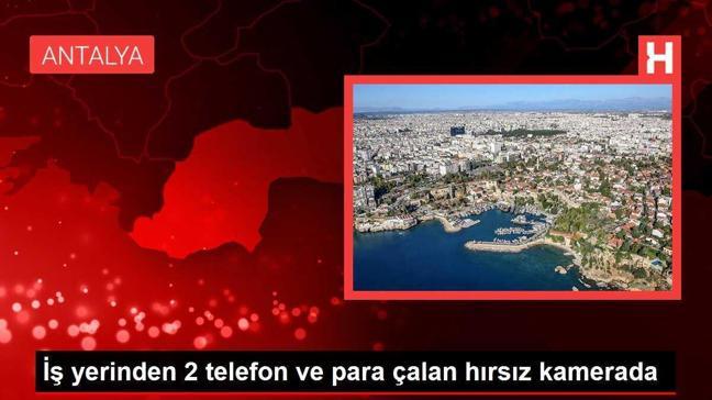 İş yerinden 2 telefon ve para çalan hırsız kamerada