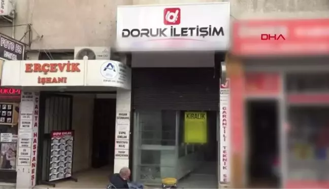 ESKİŞEHİR Eşi ve çocuğuyla birlikte öldürülen İlkay Tokkal'ın dükkanı boşaltıldı