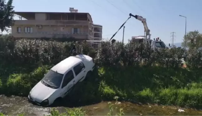 AYDIN'DA OTOMOBİL KANALA UÇTU, SÜRÜCÜ ŞANS ESERİ YARA ALMADI