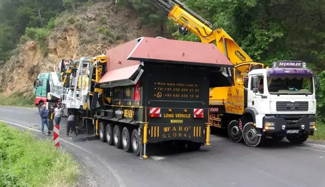 Çanakkaleİzmir kara yolu 13 saat sonra kontrollü olarak trafiğe açıldı