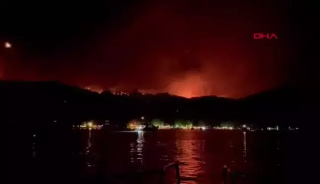 Son dakika haberleri! Marmaris'te orman yangını; alevler yerleşim yerine 100 metre kadar yaklaştı, 1 ölü YANGIN SÜRÜYOR, ALEVLER GECEYİ AYDINTIYOR